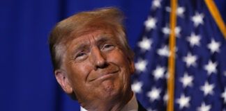 Republican presidential candidate former President Donald Trump smiles after speaking at a campaign event in Atkinson, N.H., Tuesday, Jan. 16, 2024. (AP Photo/Matt Rourke)